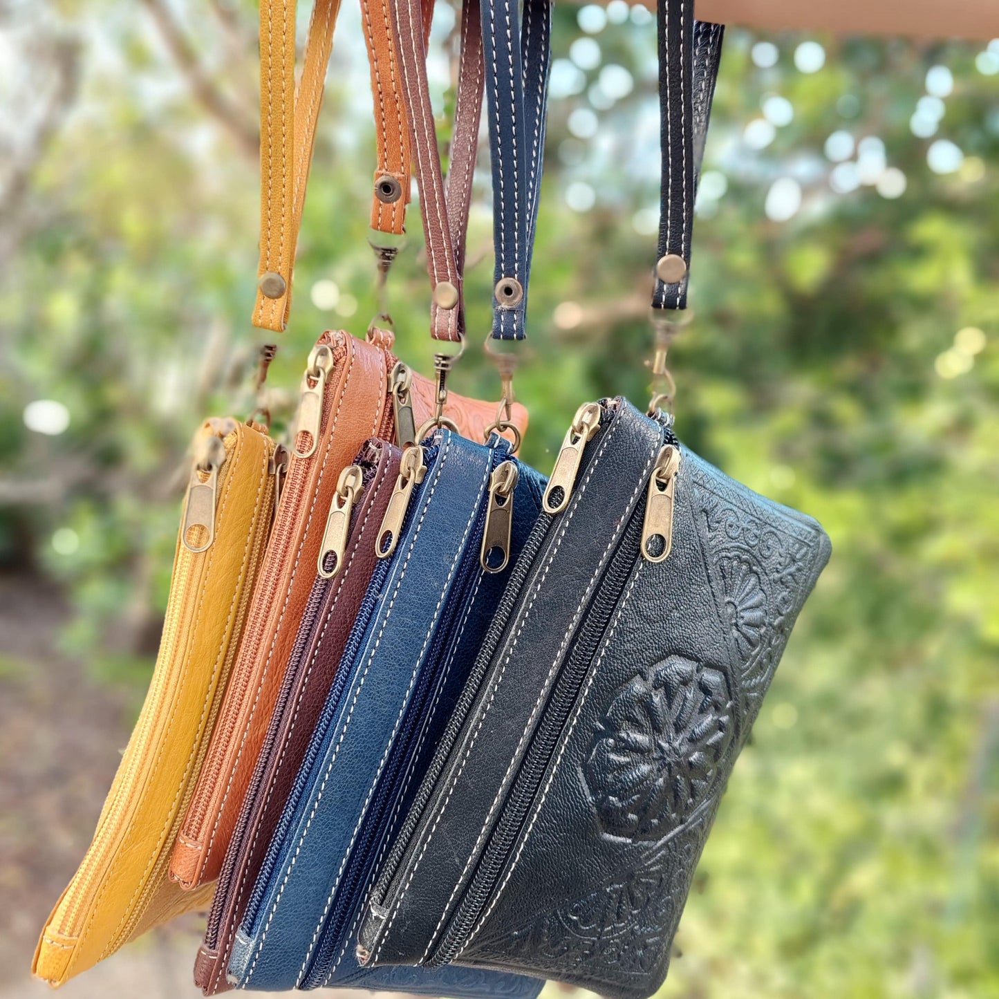 Moroccan Leather wristlets | removable wrist strap | embossed design on front | handmade | Camel leather | 