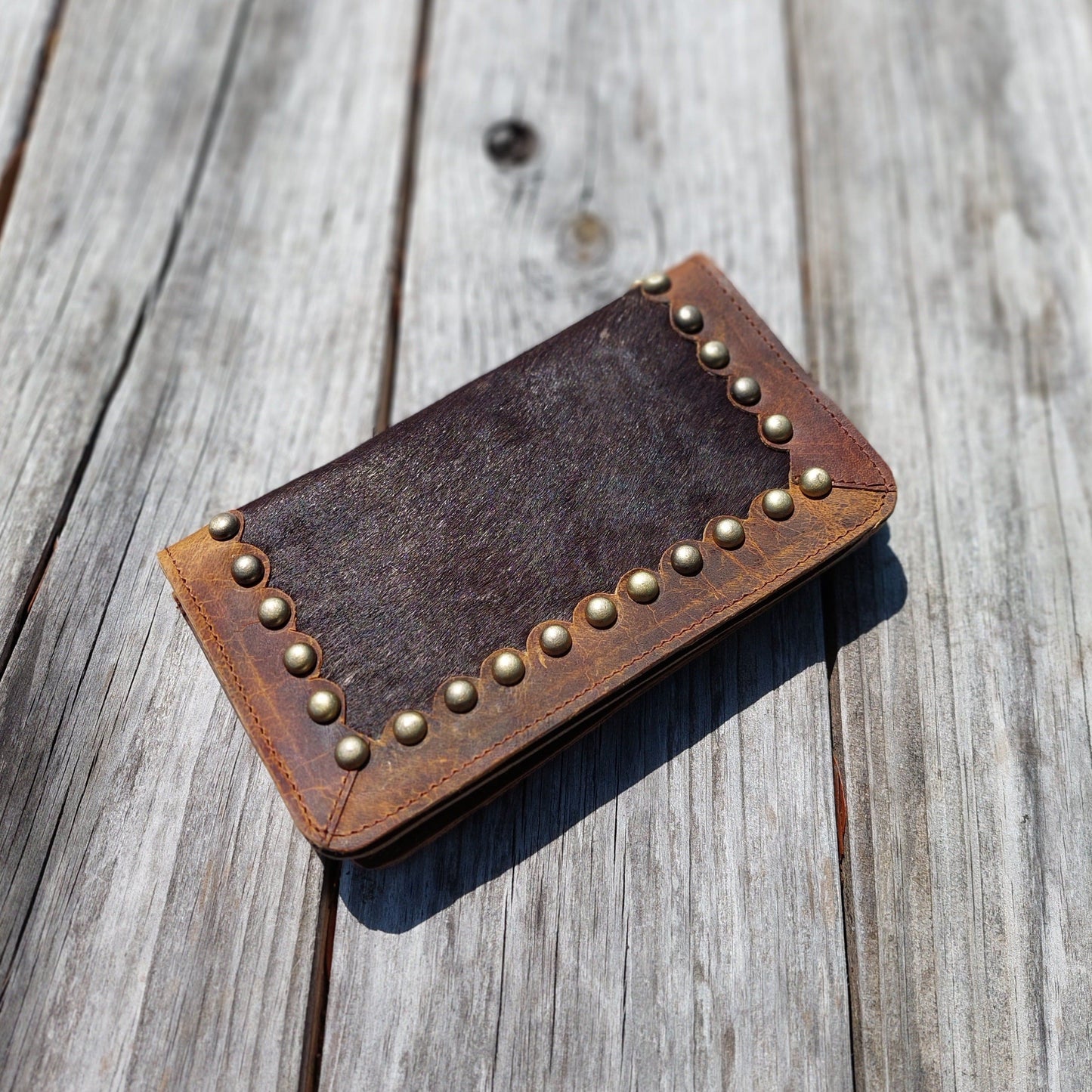 brown cowhide and long leather wallet two snap closure | scalloped leather trim around walled decorated with brass studs | handmade | Western wallet | unisex | Etsy |