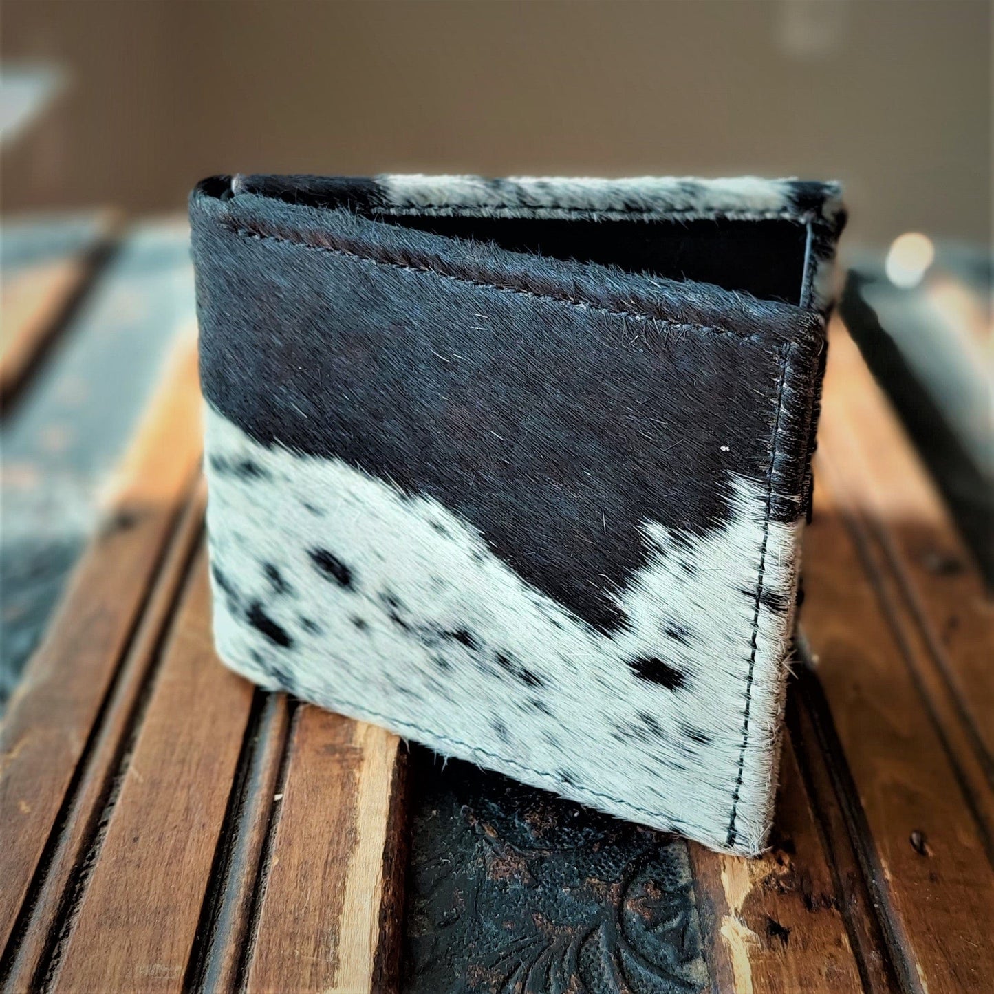 Cowhide and Leather Bi-fold Wallets